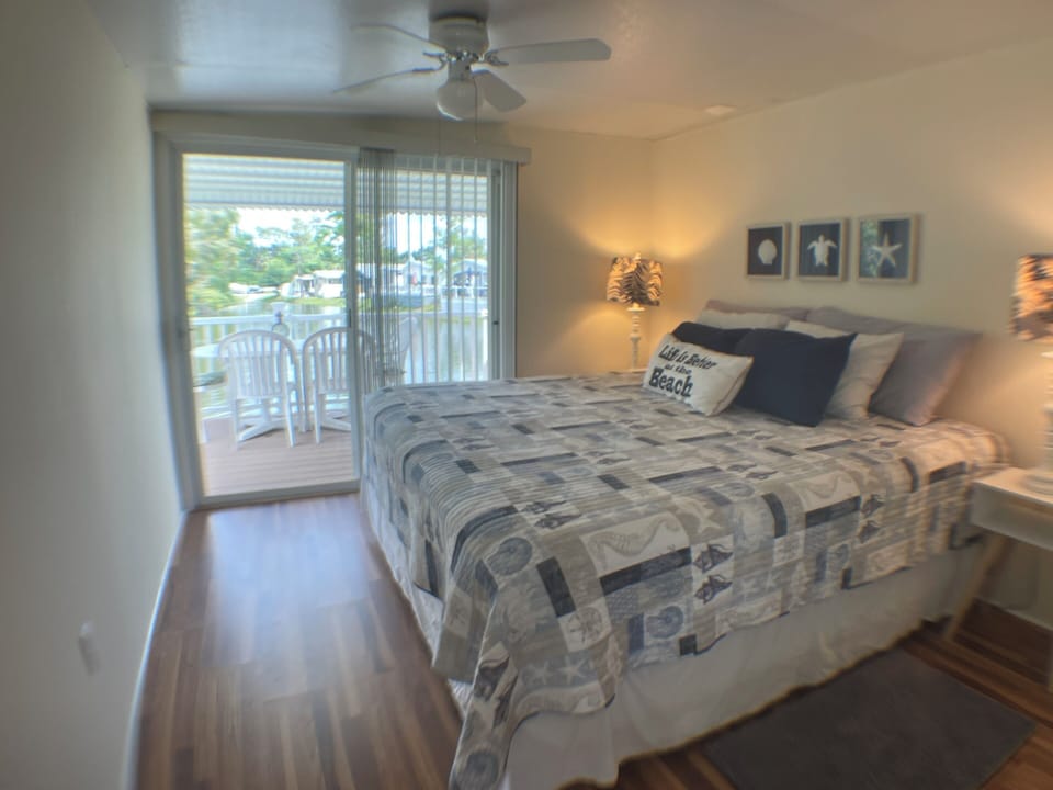 Master bedroom with sliding glass door to back deck.  Enjoy all the wildlife!