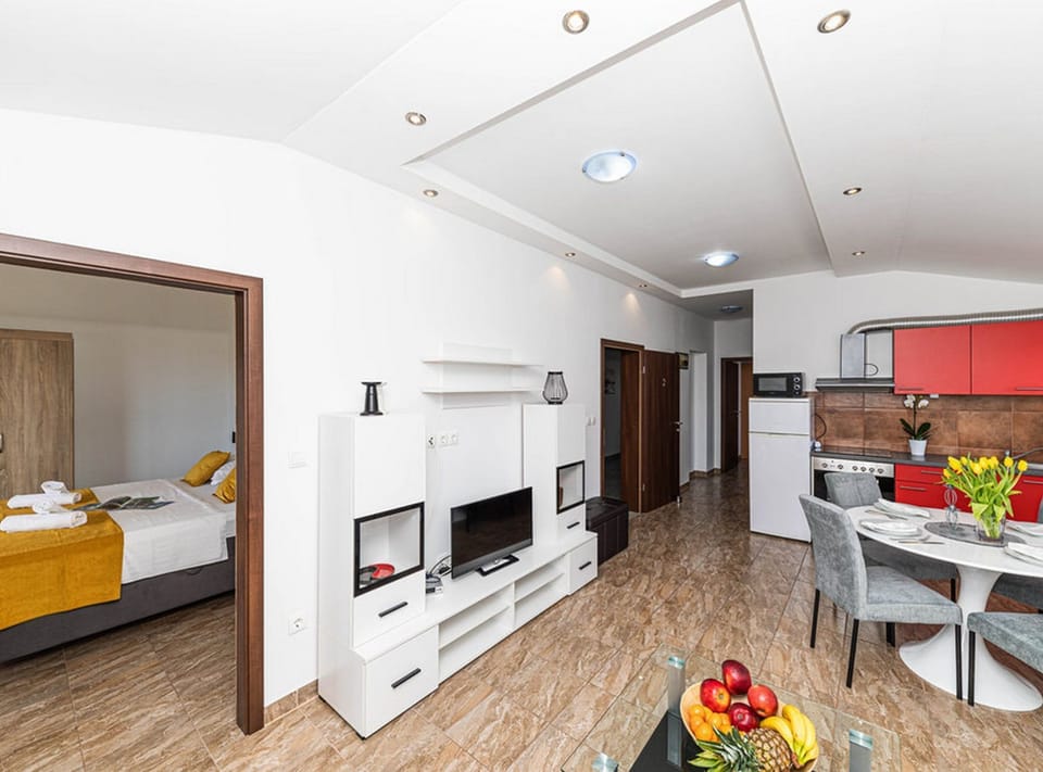 Villa (Eight Bedroom Villa with Pool and Gym) | Living room | 32-inch flat-screen TV with satellite channels