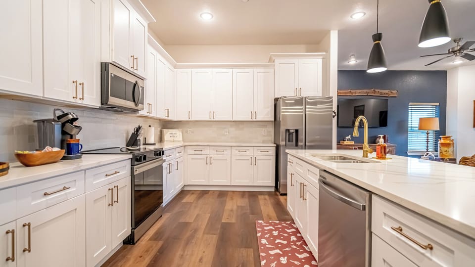 A fully equipped chef's kitchen with everything you need for a home-cooked meal or game day prep. Full-size appliances, cookware, utensils, and counter space to spare — because not every great meal should come from DoorDash.
