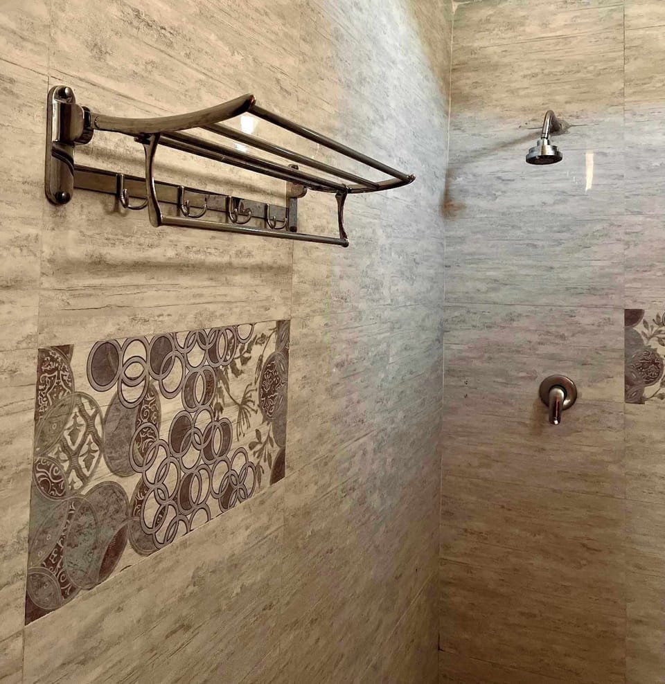 Separate tub and shower, hair dryer, towels, soap