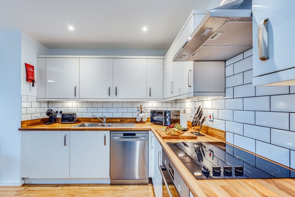 A fully equipped kitchen with everything you need to prepare a home cooked meal