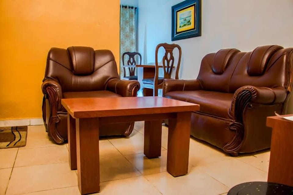 Deluxe Room, Balcony, City View | Living area