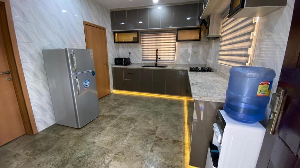 Economy Room, Balcony, City View | Private kitchen | Mini-fridge