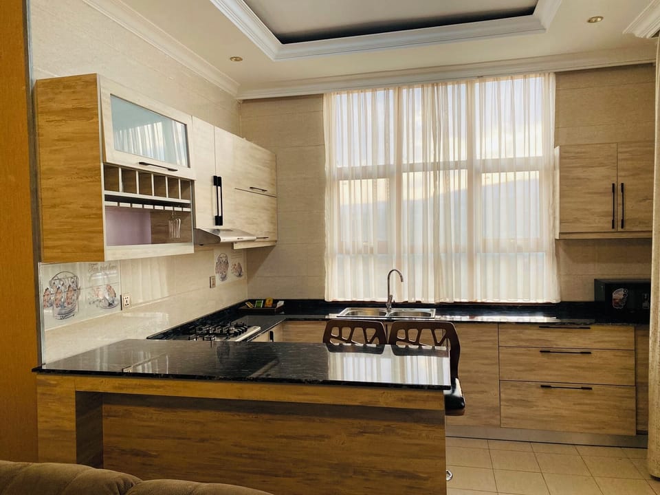 Executive Suite, City View | Private kitchenette | Highchair