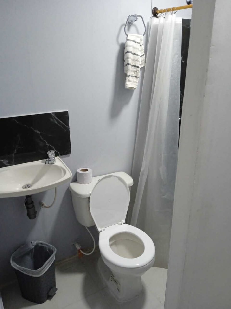 Shower, towels, soap, toilet paper