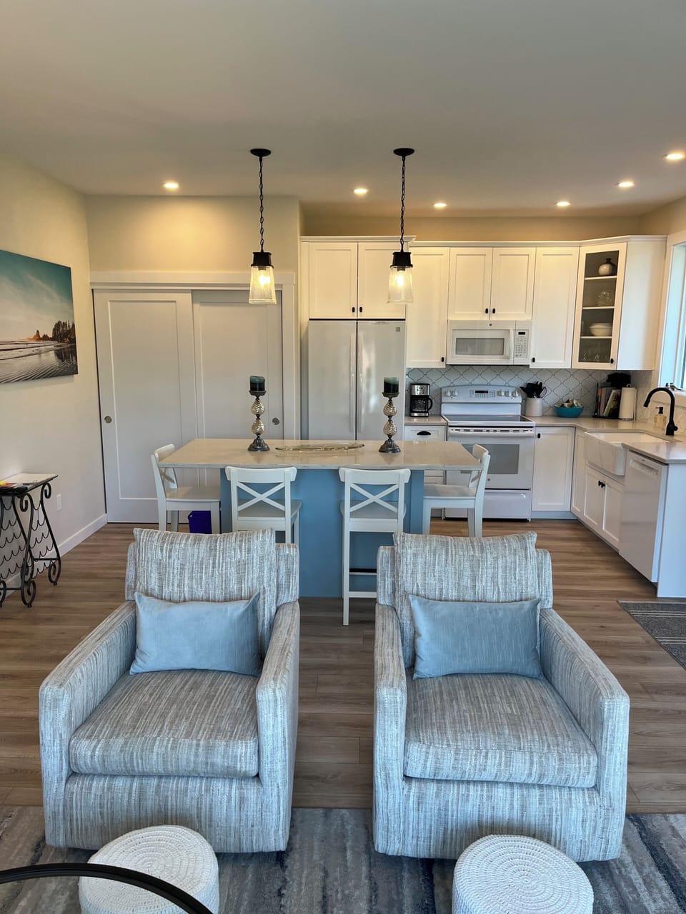 Cook at home with fully equipped kitchen, custom island and quartz countertops