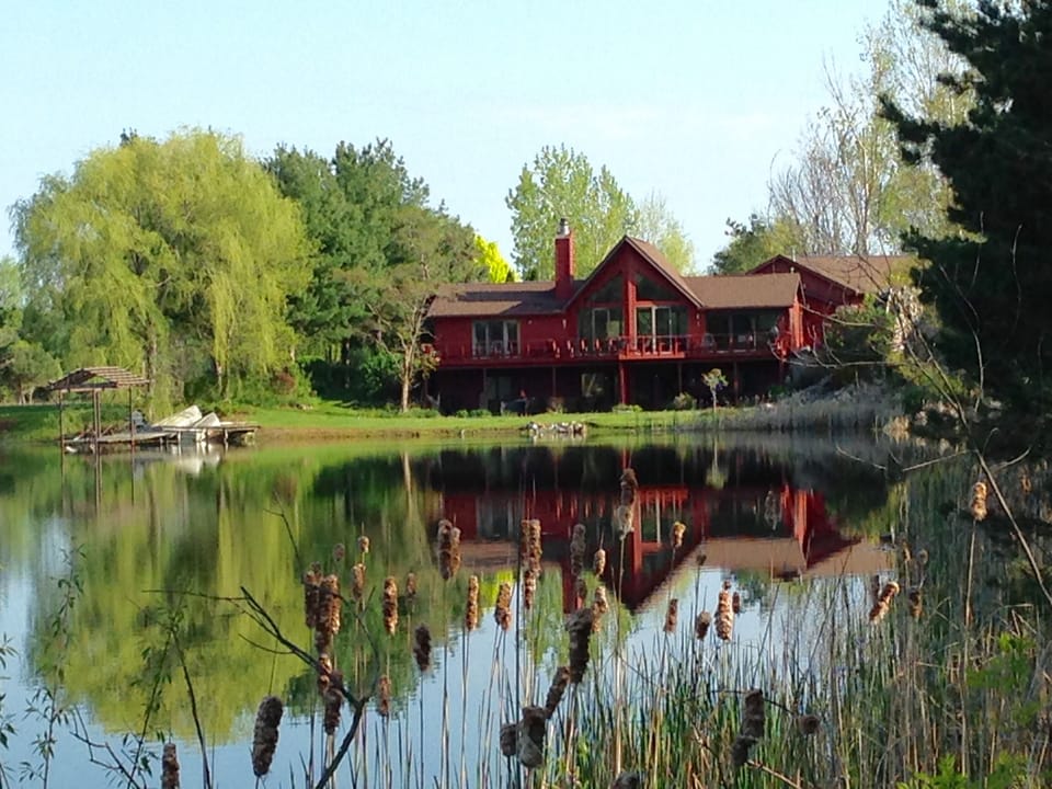 Our beautiful place sits solo on a 11 acre lake, with trails and nature’s woods.