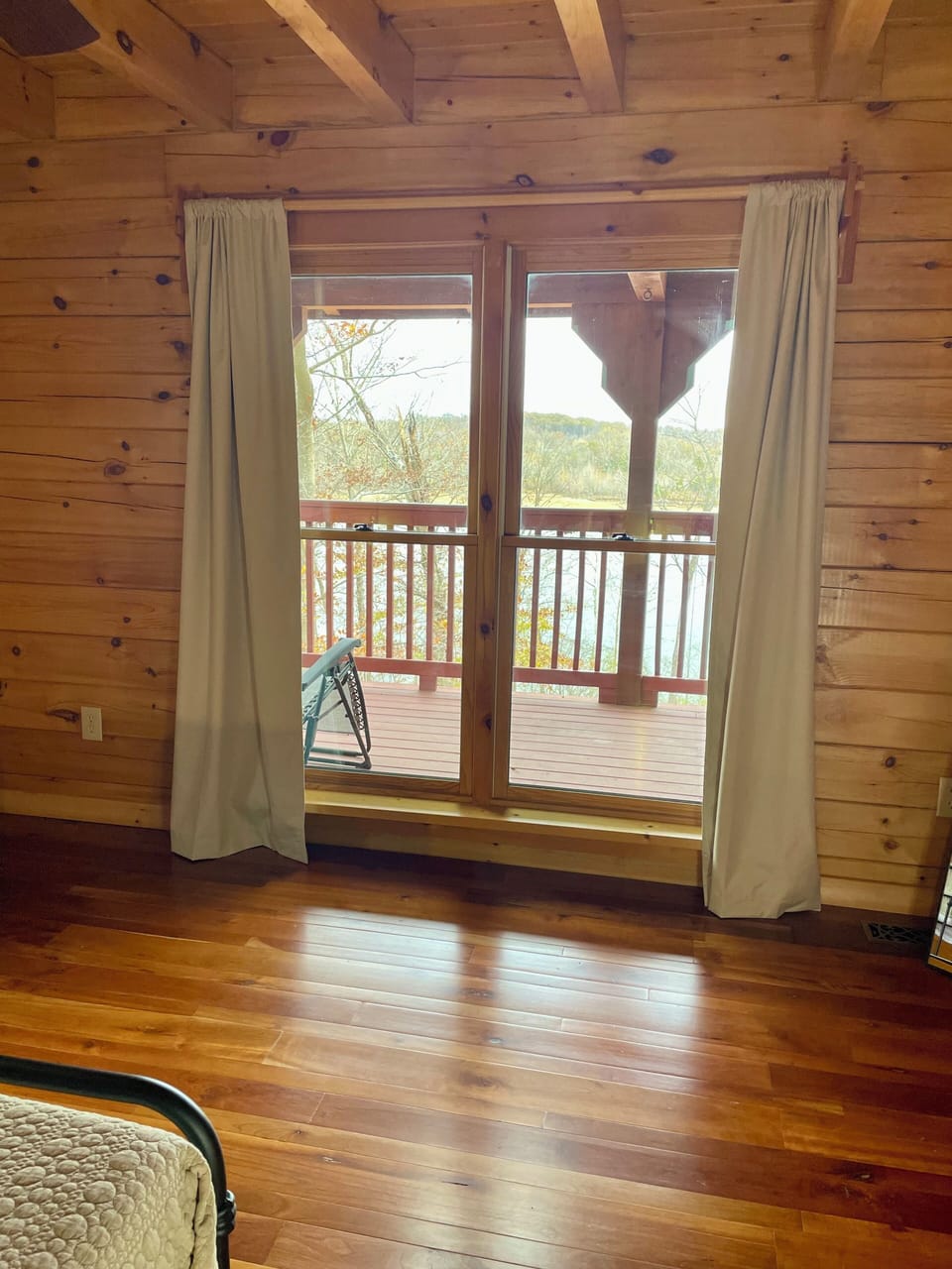 Wake up to a beautiful view of the lake in Bedroom 3. 