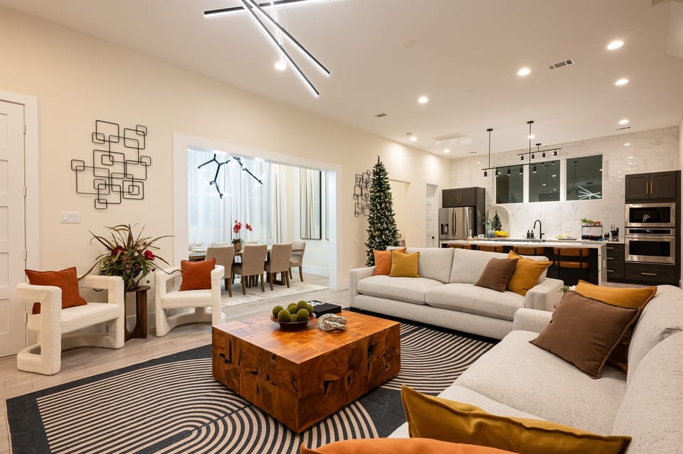 A spacious living room. Open to the dining room, office, and kitchen