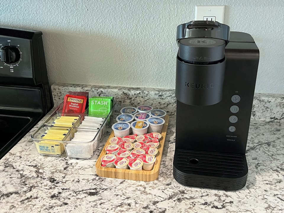 Coffee and Tea (green/black) included.  Includes sugar, splenda, and creamers