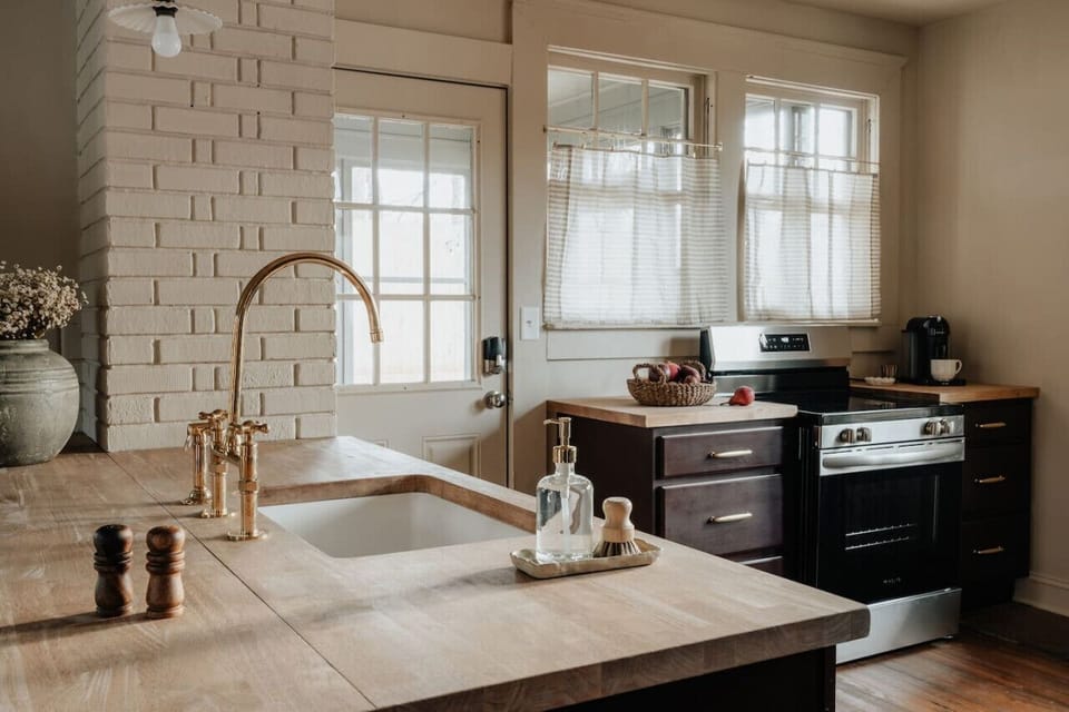 A bright and inviting kitchen, where natural light and modern design come together beautifully.