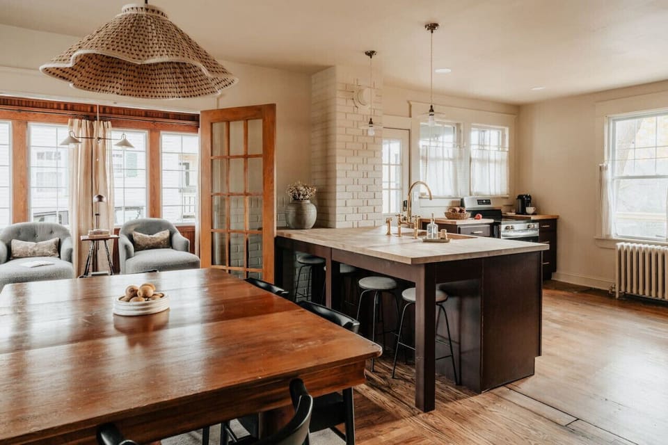 A beautifully designed kitchen and dining space, perfect for gathering and sharing meals.
