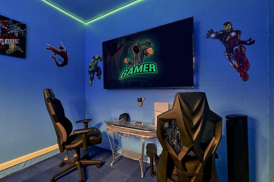 Level up your gaming experience in this epic superhero-themed setup — where Iron Man and Spidey have your back while you play!