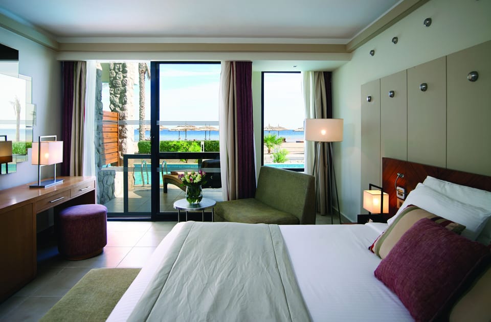Egyptian cotton sheets, premium bedding, minibar, in-room safe