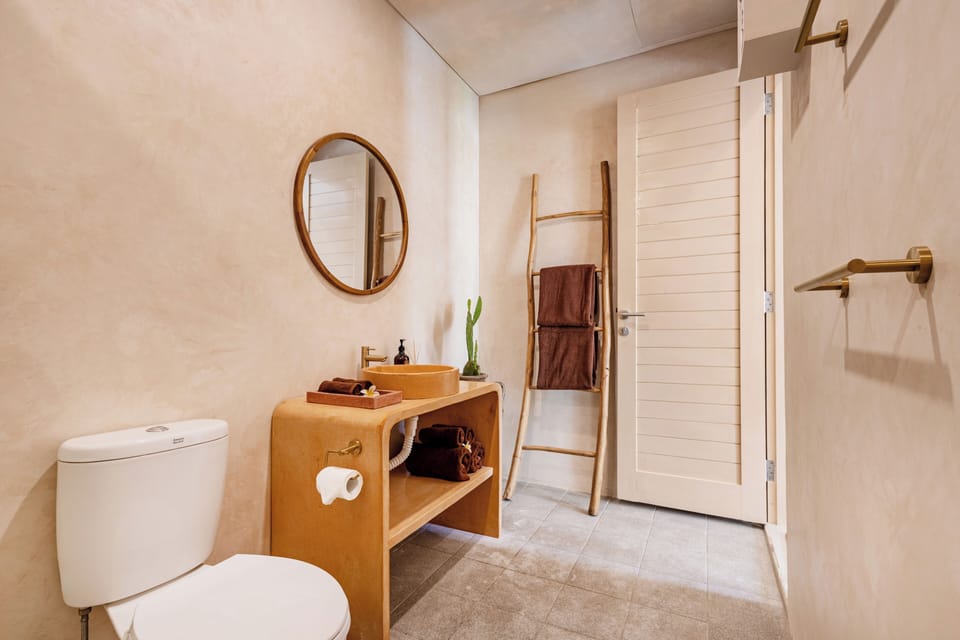 Shower, hair dryer, slippers, towels