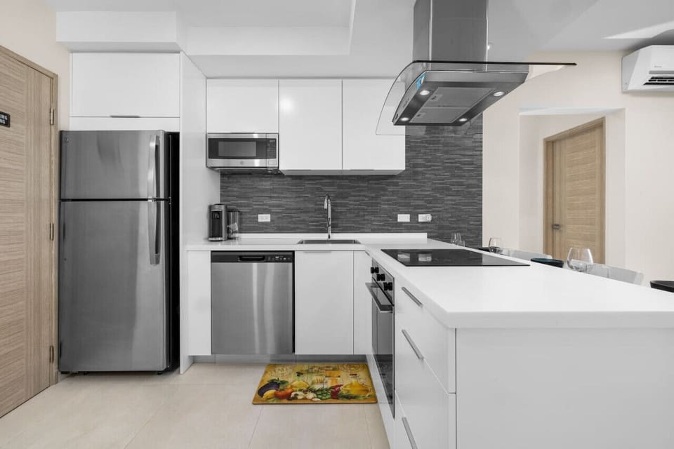 Step into the heart of culinary inspiration with our exquisite kitchen. This captivating space seamlessly combines modern elegance with functionality, creating an atmosphere where cooking becomes a delightful experience.