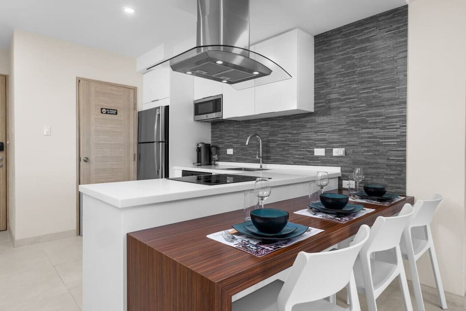 The kitchen is fully furnished with state-of-the-art cooking utensils, making it perfect for cooking any meal, from a quick breakfast to a three-course gourmet dinner.