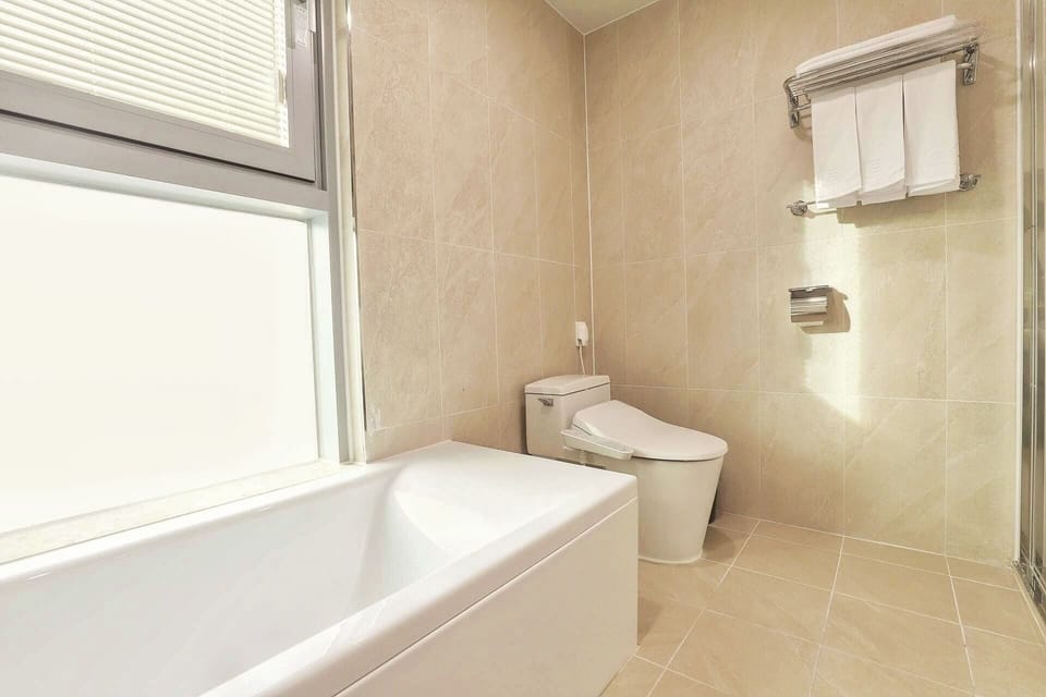 Family Suite, Mountain View | Bathroom | Hair dryer, bathrobes, bidet, soap