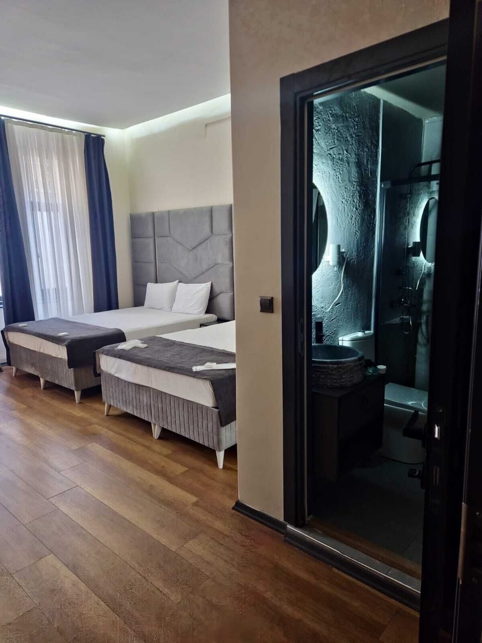 Deluxe Triple Room, City View | Premium bedding, minibar, in-room safe, soundproofing