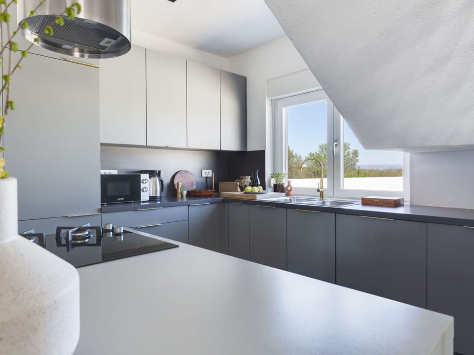 Kitchen, Countertop, Interior Design, Kitchen Appliance, Ceiling, Flooring, Home, Furniture, Light Fixture, Lighting
