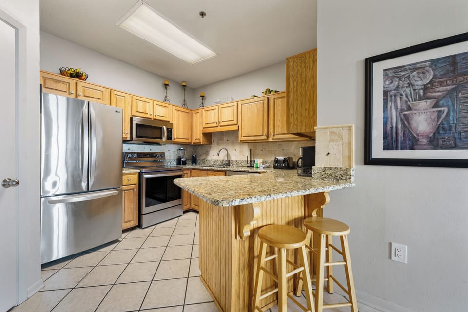 Signature Condo, 2 Bedrooms, Balcony, Beach View | Private kitchen | Fridge, microwave, oven, stovetop