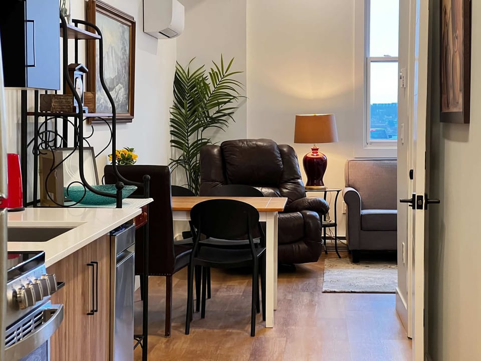 Flow seamlessly from kitchen to dining with this airy, inviting layout.