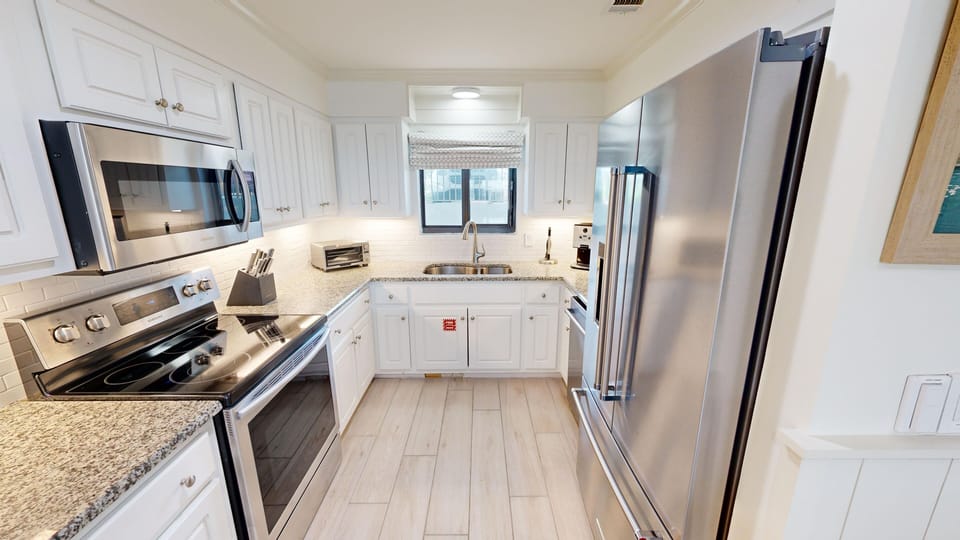 Condo, 2 Bedrooms | Private kitchen | Coffee/tea maker, fridge, oven, toaster