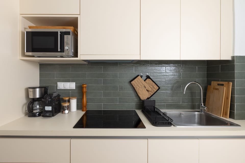Family Apartment, City View | Private kitchen | Espresso maker, coffee/tea maker, electric kettle, toaster