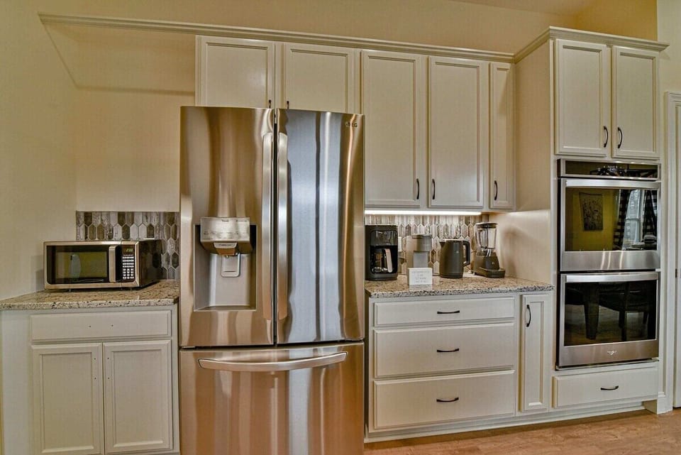 Stainless Steel Fridge, Microwave, and Double Ovens