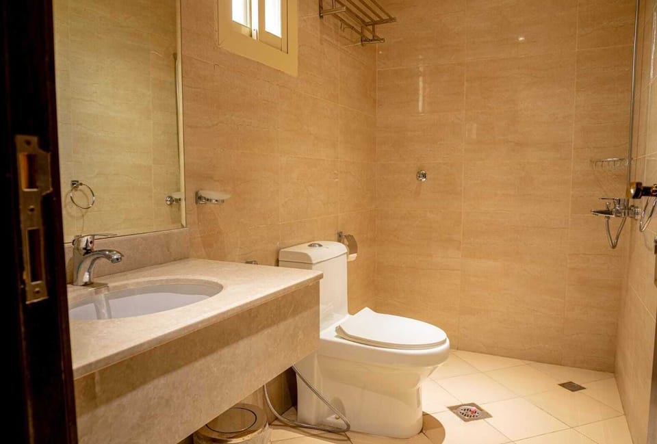 Shower, free toiletries, hair dryer, slippers