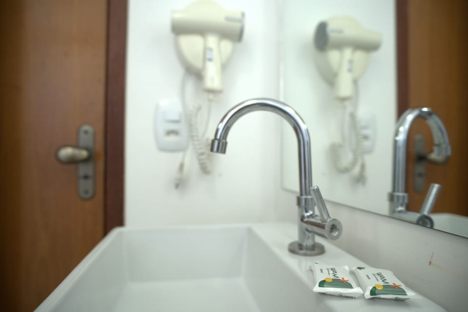 Shower, towels, soap, toilet paper