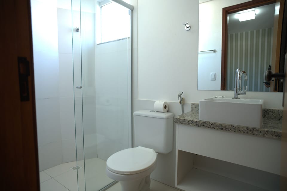 Shower, towels, soap, toilet paper