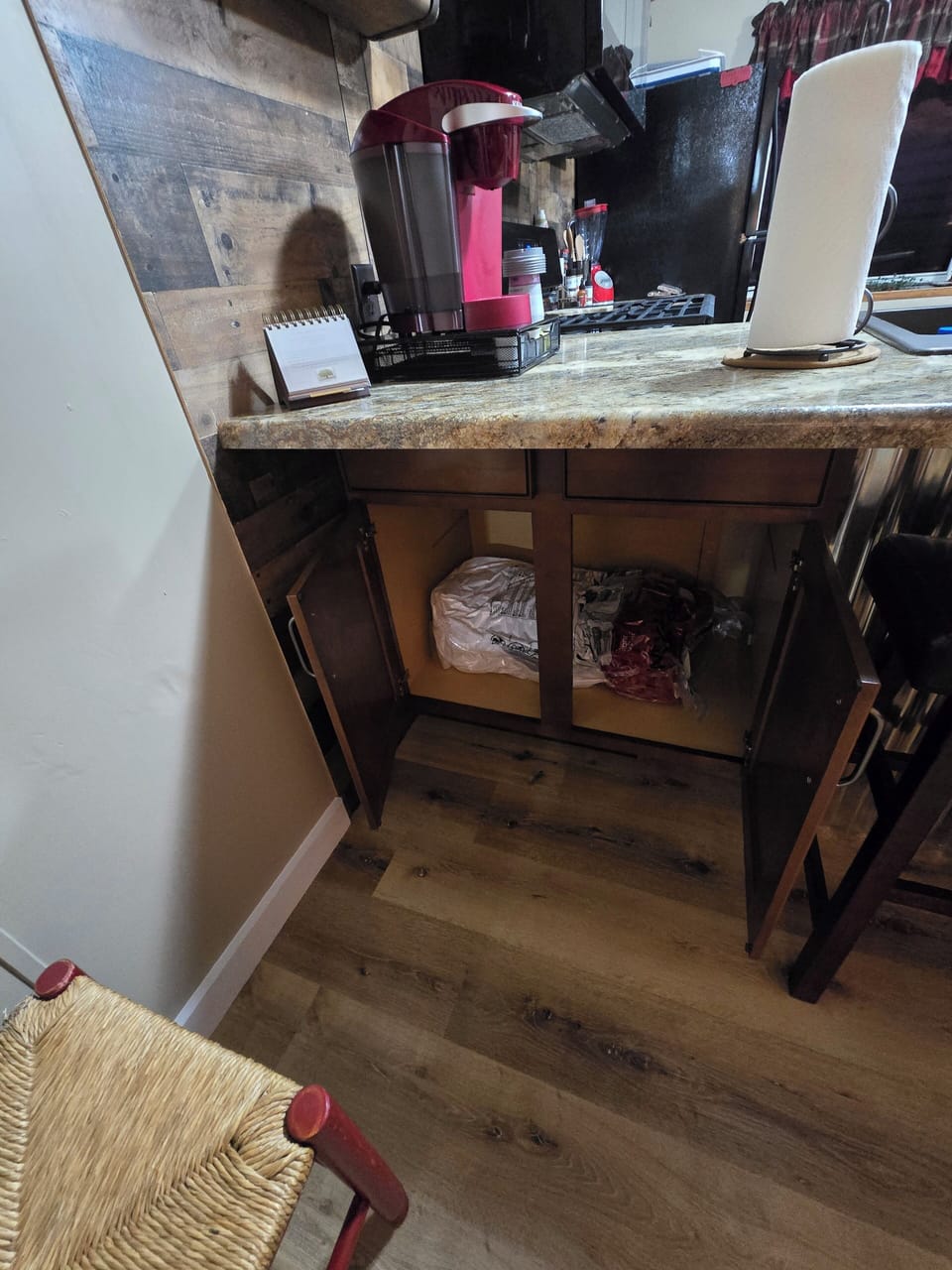 Cabinet with hidabed linens sanitized and laundered, shrink wrapped for you