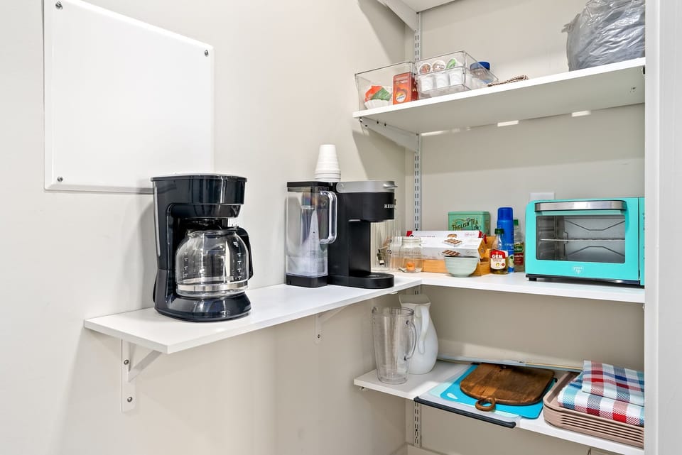 Pantry area with coffee machines