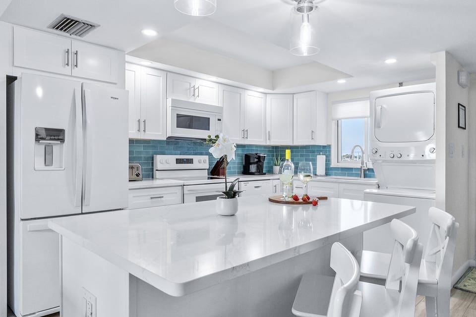 Coastal modern kitchen with spacious island