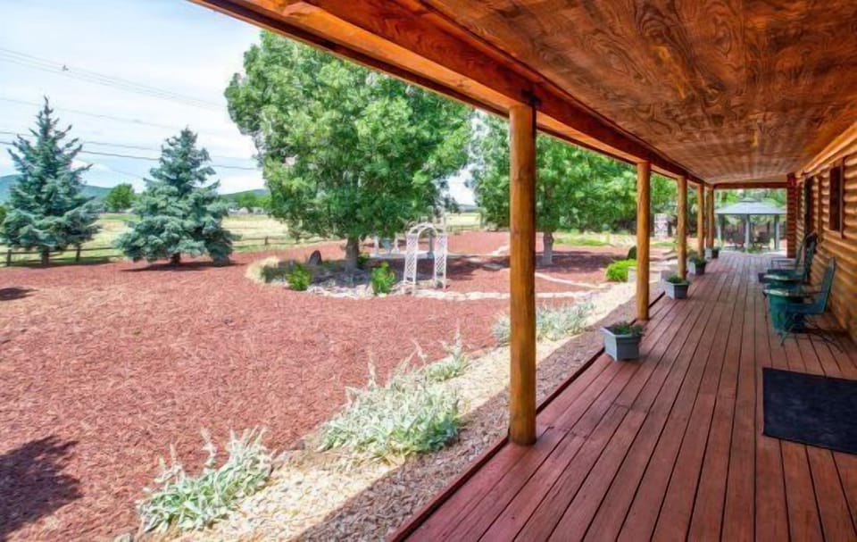 Wrap-Around Deck: Access the outdoors through a private screened door leading to your wrap-around deck. With mountain views and steam engines passing by, it's a perfect spot for morning coffee or evening relaxation.
