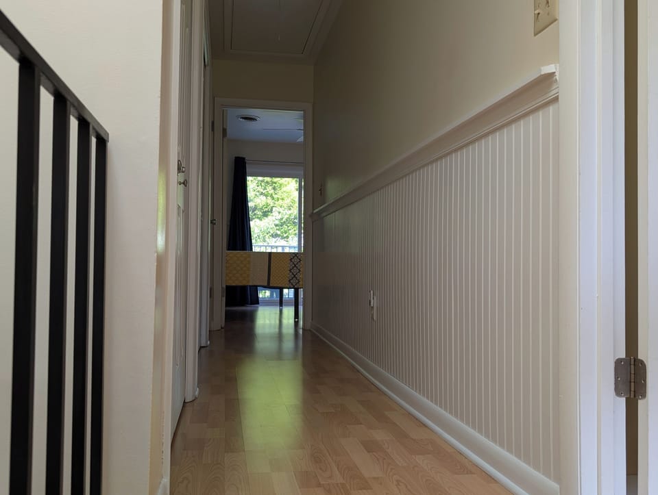 Upstairs hallway with laundry