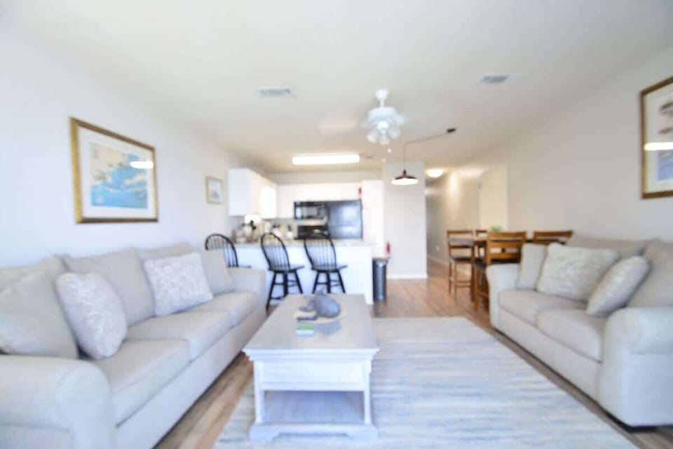 East side living area with plenty of comfortable seating for the whole family