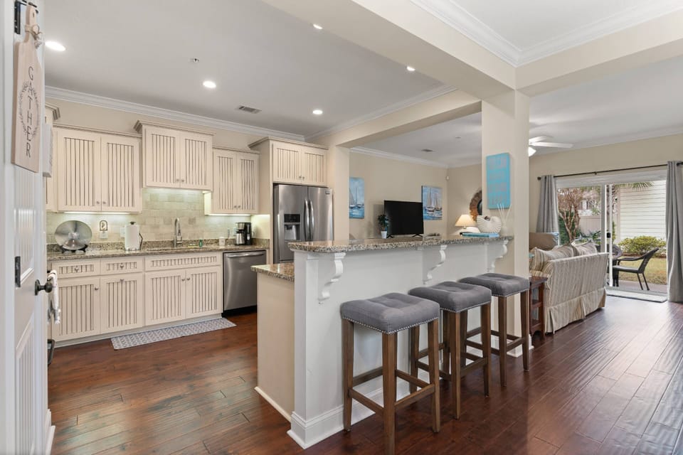 Sit at the bar and watch someone else cook for a change!