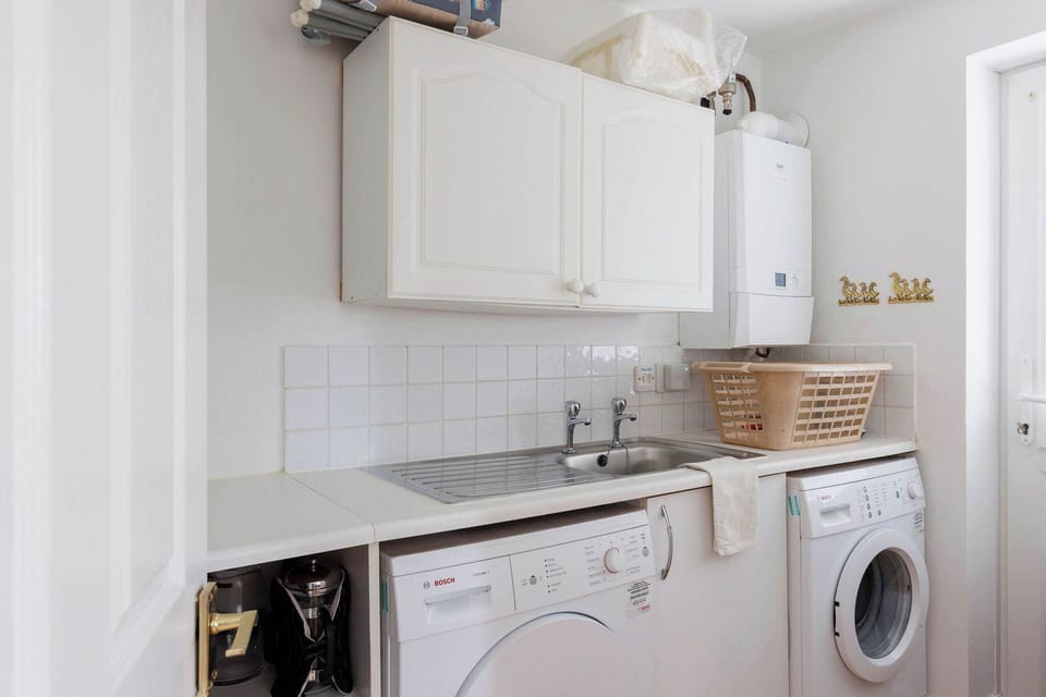 The separate utility room has everything you need to keep on top of holiday washing.