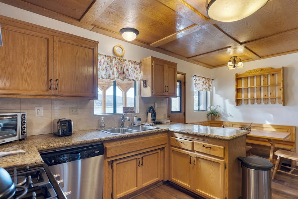 Wooden cabinets all over the kitchen.