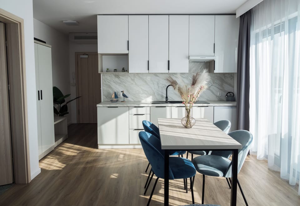 Family Apartment | Laptop workspace, blackout drapes, soundproofing, iron/ironing board