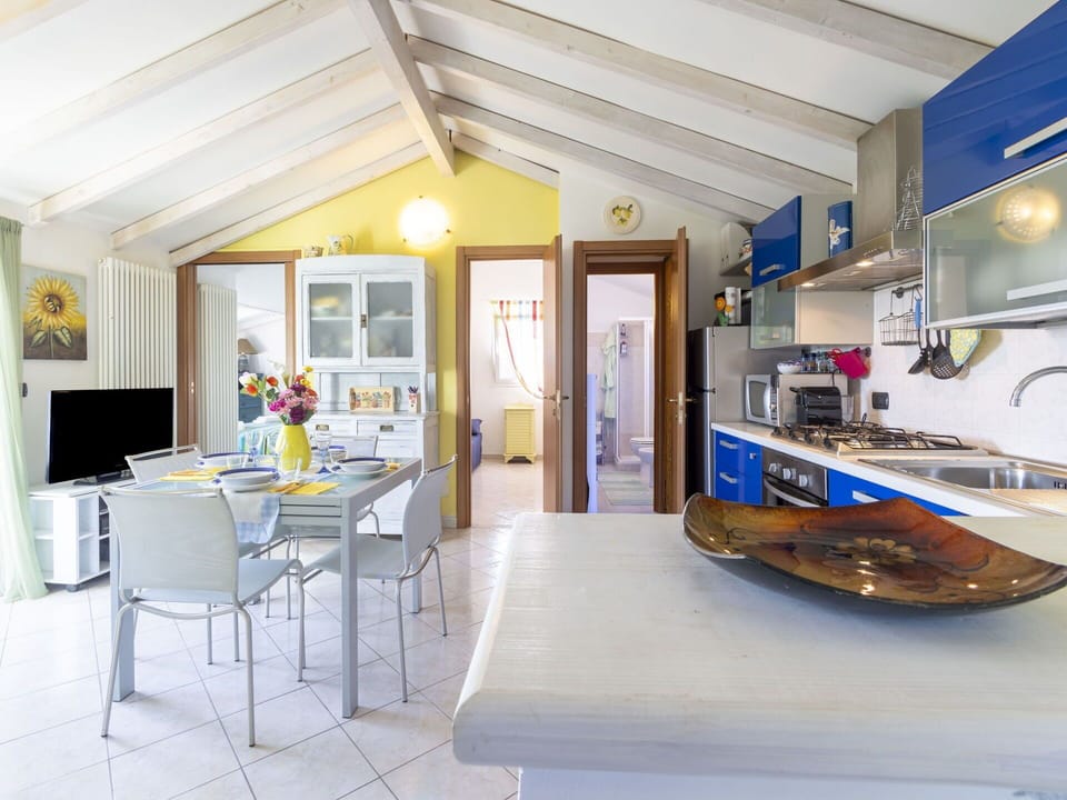 Furniture, Table, Azure, Chair, Building, Picture Frame, Interior Design, Architecture, Floor, Flooring