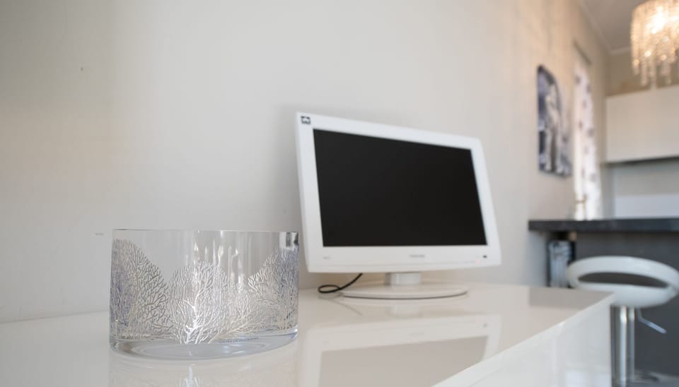 Basic Apartment | Living area | 10-inch Smart TV with digital channels