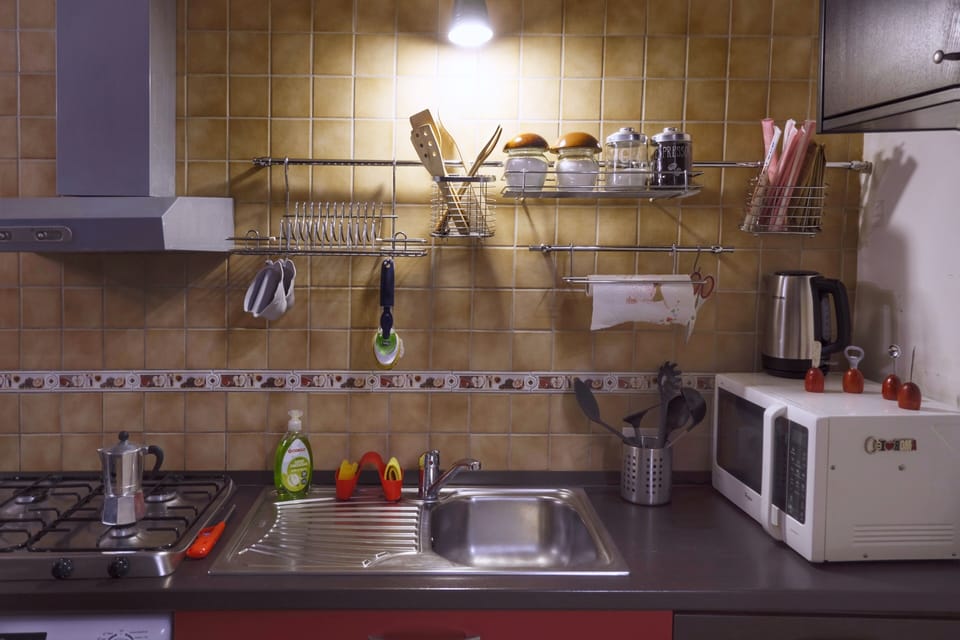 Apartment, 1 Queen Bed, Non Smoking | Private kitchen | Microwave, stovetop, espresso maker, electric kettle
