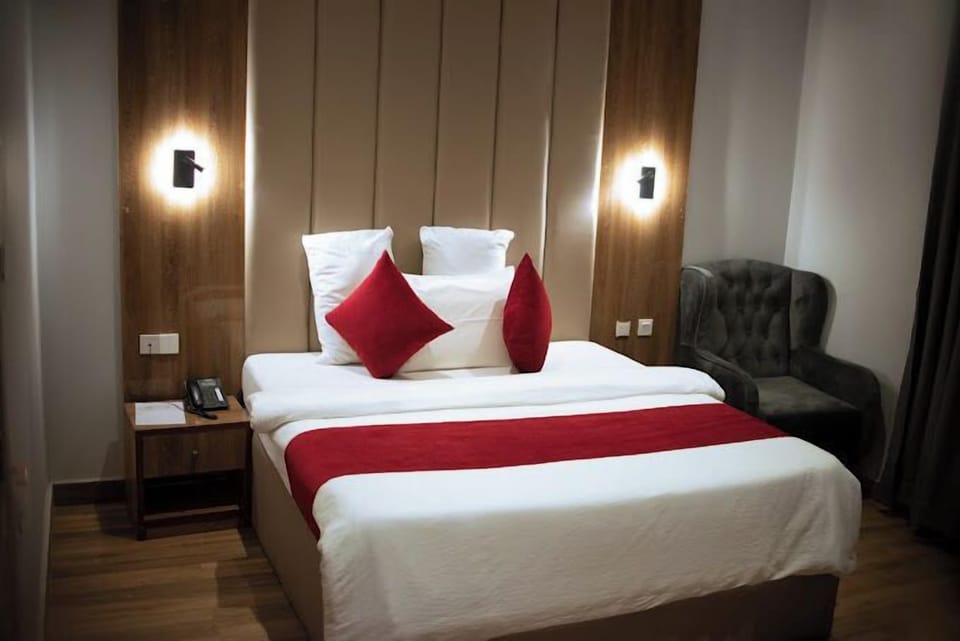 Economy Room, Balcony, City View | Laptop workspace, iron/ironing board, free WiFi