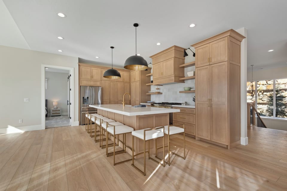 A fully equipped chefs kitchen with high end appliances and accessories