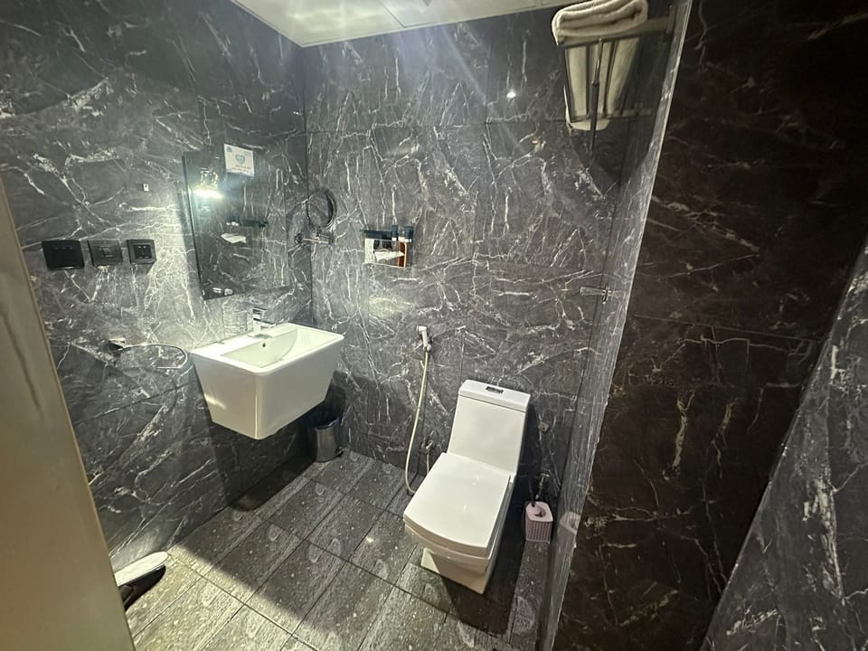 Shower, bidet, towels, soap