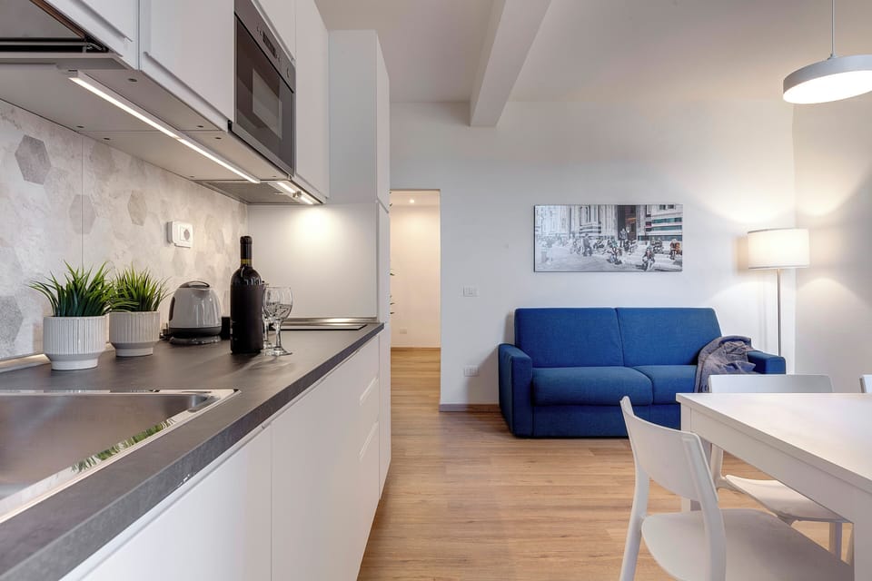 Apartment, 2 Bedrooms | Living area | 24-inch flat-screen TV with digital channels