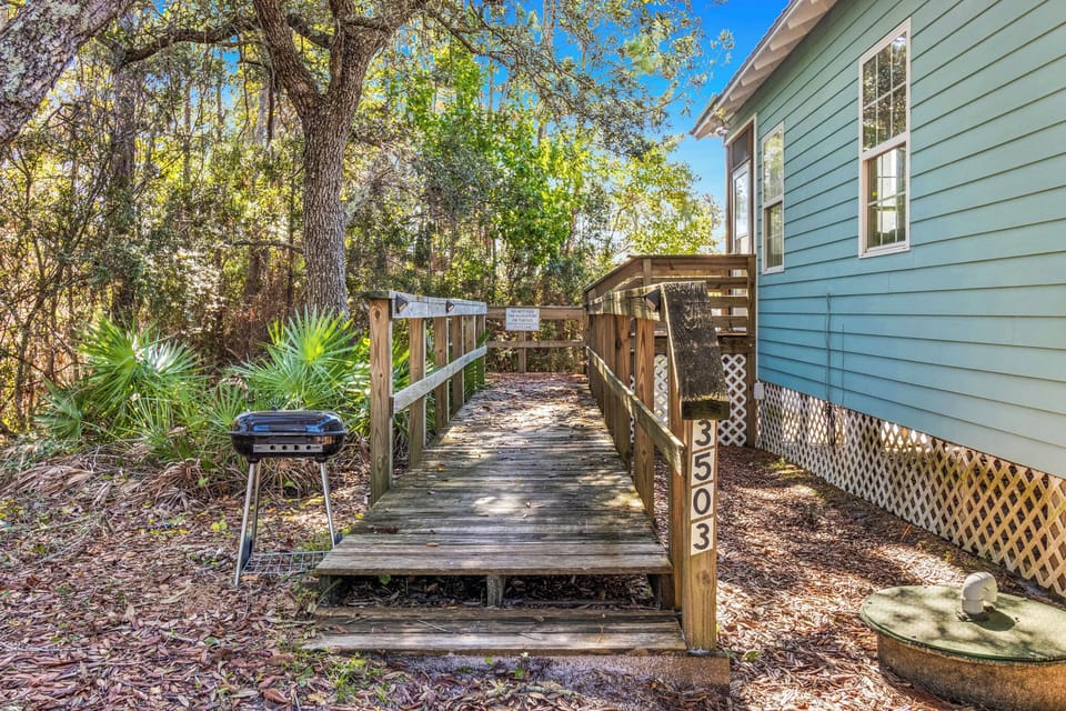 Front Exterior - Walkway and Charcoal Grill